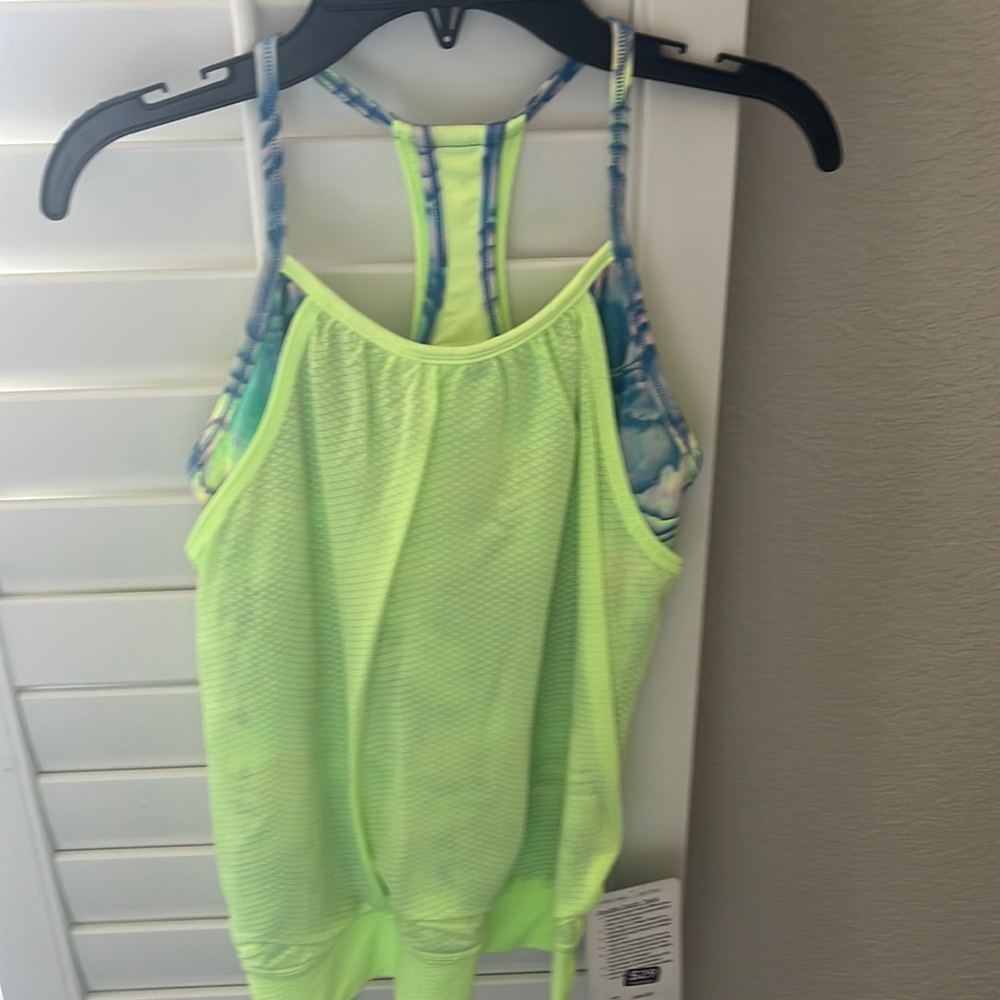 Ivivva tank. New condition. Built in bra. Size 10. Double Dutch tank.
